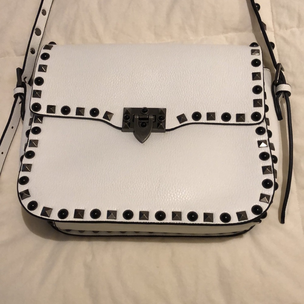 Studded replica white handbag